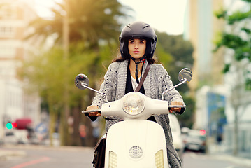 Image showing Woman, motorbike and transport in city, road or thinking with helmet, journey or travel in summer sunshine. Girl, motorcycle and outdoor in metro for transportation, vacation or freedom on street