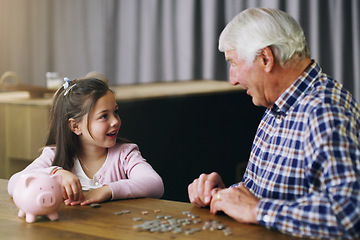 Image showing Money, piggy bank and learning with child and grandfather for savings, investment and help. Growth, cash and future with young girl and old man in family home for generations, finance and support