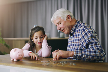 Image showing Money, piggy bank and help with child and grandfather for savings, investment and learning. Growth, cash and future with young girl and old man in family home for generations, finance and support