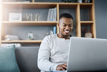 Image showing Happy black man with laptop, streaming online and relax in living room, subscription service with internet and smile. Technology, connectivity and male person chill at home watching tv show or film