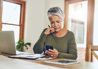 Image showing Senior woman, budget planning and mobile savings checklist with phone at home. Pension, contract and elderly female person with debt, online tax and paper form in a house with bills and web admin