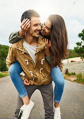 Image showing Care, love and piggyback with couple in road for happy, smile and bonding. Happiness, relax and weekend with man carrying woman on countryside date for spring, anniversary vacation and support