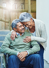 Image showing Disability, wheelchair and senior couple hug with care, support and love by elderly happy people in retirement. Disabled, rehabilitation and old man with helping woman with empathy in marriage