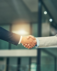 Image showing Partnership, handshake and hands of business people in office for hiring, recruitment deal and thank you. Corporate, collaboration and male workers shaking hands for onboarding, support and teamwork