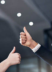 Image showing Collaboration, thumbs up and hands of business people in office for feedback, good news and agreement. Corporate, approval and workers with gesture for thank you, support and yes sign in workplace