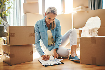 Image showing Woman, paperwork and boxes in apartment on the floor for investment in real estate for house. Document, lease and person with agreement for new home in living room with rent for property and growth.