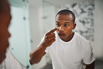 Image showing Cream, skincare and mirror with black man in bathroom for beauty, morning routine and grooming. Cleaning, hygiene and self care with reflection of male person at home for facial, glow and lotion