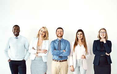 Image showing Group, portrait and business people with arms crossed by white wall background mockup space in office. Face, confident smile and employees standing together with teamwork, diversity and collaboration