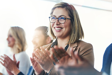 Image showing Applause, meeting and conference with business woman for support, teamwork and event celebration. Wow, winner and target with audience clapping in workshop seminar for goal, motivation or agreement