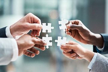 Image showing Puzzle, hands and group of people for solution, teamwork and goals, achievement and workflow success. Team building, games and development of woman and staff problem solving, synergy or collaboration