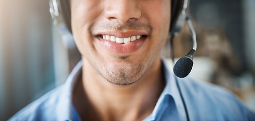 Image showing Happy man, teeth and smile in call center with mic for customer service or telemarketing at office. Closeup of friendly male person or consultant agent mouth smiling with headphones in contact us