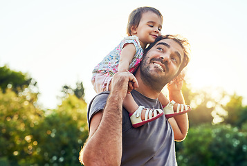 Image showing Dad, daughter and smile on shoulders in park with trust, happiness or love in summer sunshine. Young family, baby girl or walk together for freedom, bond and piggyback with care, backyard or garden