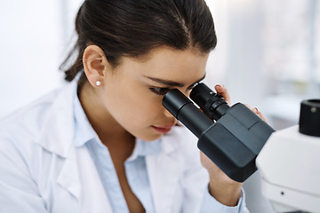 Image showing Research, woman and scientist with microscope in laboratory for medical study. Healthcare, science and female doctor with scope equipment for sample analysis, particle testing and lab experiment.