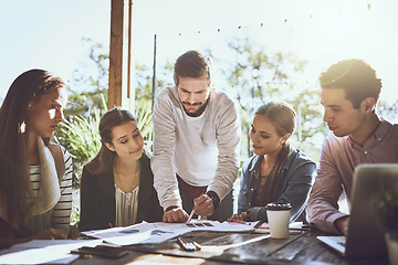 Image showing Business people, group and cafe with planning, documents or brainstorming for goal with smile. Men, women and discussion with paperwork, problem solving or strategy for startup team in coffee shop