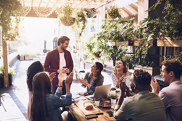 Image showing Applause, restaurant and business people in lunch meeting for discussion, planning and profit goal. Cafe, teamwork success and men and women clapping for winning, collaboration and achievement