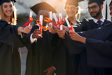 Image showing Graduation, students and diploma in hands of college or university friends together. Diversity men and women group outdoor to celebrate education achievement, success and certificate at school event