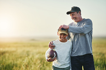 Image showing Father, kid smile and rugby ball in a countryside field for bonding and fun in nature. Mockup, dad and young child together with happiness ready to start game outdoor on grass at farm with space