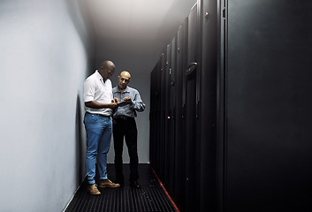 Image showing Server room, people or technicians with tablet for cybersecurity or internet glitch with teamwork. IT support help, collaboration or African engineers fixing network data for information technology