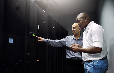 Image showing Server room, people or technicians with tablet for hardware, cybersecurity glitch or error with teamwork. Black man, collaboration or engineers fixing network for information technology or IT support