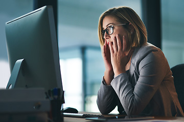 Image showing Computer, anxiety and business woman in office, tired or fatigue while working late at night. Burnout, deadline and female person with stress, depression or brain fog, sick or exhausted in workplace.