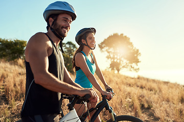 Image showing Happy couple, nature and cycling in the mountains for fitness and exercise together. Bike, wellness and young people with outdoor adventure and sports training with happiness and freedom mockup