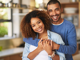 Image showing Love, smile and hug, portrait of happy couple in kitchen, new home, embrace and healthy relationship. Happiness, man and woman hugging with affection, romance and marriage, young people in apartment.
