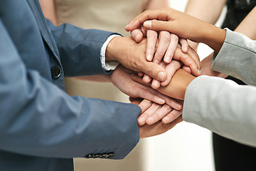 Image showing Business people, meeting and hands together in agreement for collaboration at the office. Hand of group piling for teamwork motivation, trust or support in solidarity for company goals at workplace