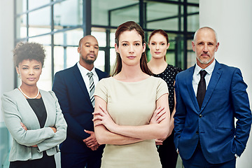 Image showing Portrait, business people and serious group with arms crossed in diversity, executive commitment or confident in office. Woman, leadership and global team of professional corporate employees together