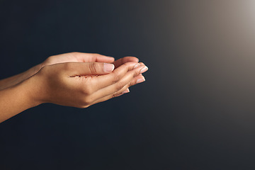 Image showing Hands open, charity and begging in studio with poverty, asking and donation of a poor person. Gray background, mockup and economic crisis with woman holding hand and palm for care, aid and kindness