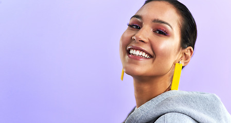 Image showing Young woman, portrait and makeup with jewelry, happiness and mockup in studio. Purple background, female person and gen z fashion with face and millennial style with a smile and beauty cosmetics