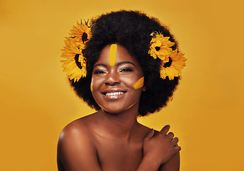 Image showing Makeup, sunflower and happy with portrait of black woman in studio for beauty, creative or spring. Natural, cosmetics and floral with face of model on yellow background for art, self love or glow