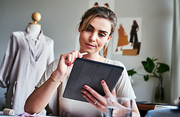 Image showing Fashion, ideas and thinking, woman with tablet and mannequin at small business with creative process in studio. Creativity, textile and designer working on digital sketch with pattern and drawing.