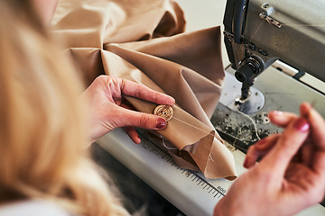 Image showing Sewing machine, woman hands and fashion designer with button and thread work. Small business, entrepreneur and female tailor with boutique and creative worker working with machinery for clothing