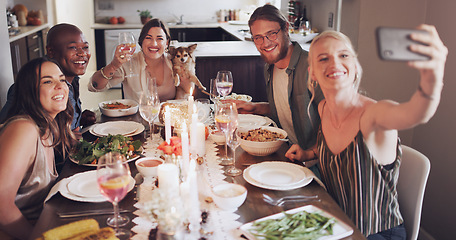 Image showing Diversity, dining table and friends taking a selfie at dinner, party or event at a modern home. Happy, smile and young people taking a picture together while eating a lunch meal with wine in a house.