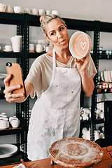 Image showing Happy woman, pottery and selfie in small business for social media, advertising or fun vlog at store. Female person or retail owner with tongue out and clay bowl for funny photo or post on smartphone