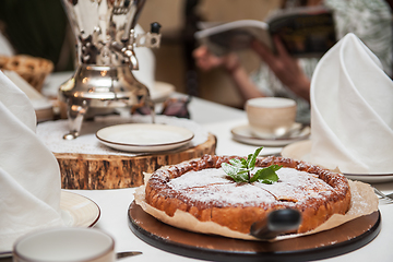 Image showing Apples pie with samovar