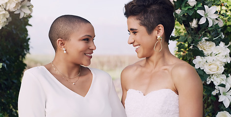 Image showing Love, marriage and lgbtq with lesbian couple at wedding for celebration, gay and pride. Smile, spring and happiness with women at ceremony event for partner commitment, queer relationship and freedom