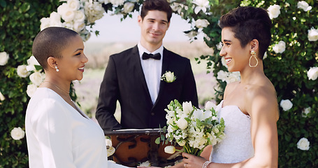 Image showing Wedding, vows and lesbian couple making commitment at altar with smile, love and minister for ceremony. Lgbt marriage, celebration and happy woman with bride, diversity and women with lgbtq pride.