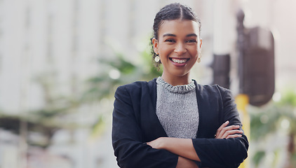 Image showing Portrait, business and woman with arms crossed, city and smile with confidence, career and consultant. Face, female person and employee outdoor, professional and skills with happiness or entrepreneur