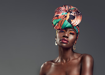 Image showing Fashion, beauty and portrait of black woman in makeup on gray background for glamour, cosmetics and luxury. Studio, designer and face of female person in exotic jewelry, African style and head scarf