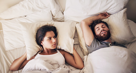 Image showing Frustrated woman, snoring man and bed in a home with angry female person from noise. Tired, sleeping and morning with young people in a bedroom in a house together with a fight, anger and fatigue