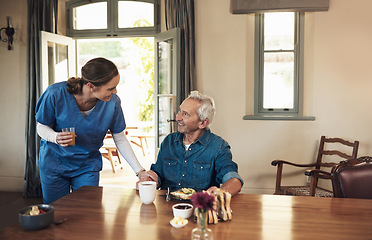 Image showing Senior man, nurse and breakfast with check, talking and happy with food, nutrition and care in nursing home. Retirement, assisted living or helping hand from woman in house with conversation for diet