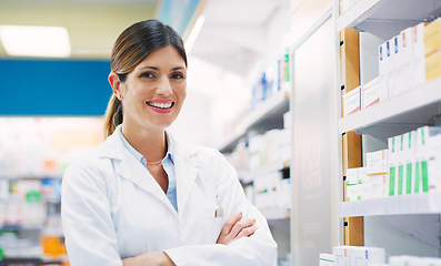 Image showing Store shelf, happy woman and pharmacist portrait with crossed arms, pride and chemist in drugs store, clinic or shop. Happiness, pharmacy product and healthcare person confident in pills dispensary