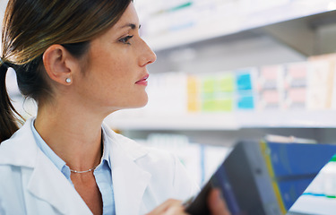 Image showing Pharmacy clipboard, store shelf and woman check, search and doing inventory stock take of pills, supplements or medicine. Healthcare shop, pharmaceutical and female pharmacist with product checklist