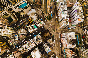 Image showing Skyscraper, architecture and aerial view of city buildings in Hong Kong in street. Urban landscape, cityscape building and drone of skyscrapers, infrastructure and property in metropolis of cbd.