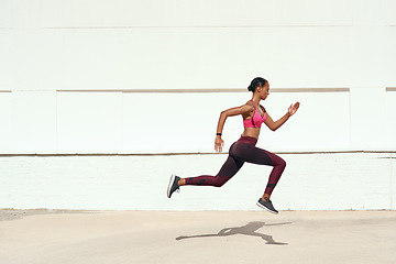 Image showing Woman, fitness and running on mockup for training, exercise or healthy cardio workout outdoors. Fit, active and sporty female person or runner exercising for health and wellness on mock up space