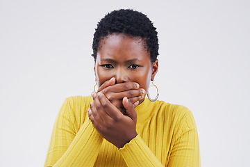Image showing Shock, bad news and female person in a studio with a omg, wow or wtf facial expression for emoji. Emotion, horror and African woman with a surprise face with hands on her mouth by white background.