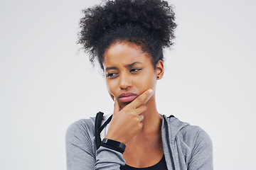 Image showing Isolated, black woman and serious thinking of workout idea, fitness or planning exercise and health goals. Girl, think or plan decision for training, gym or remember sport ideas on white background