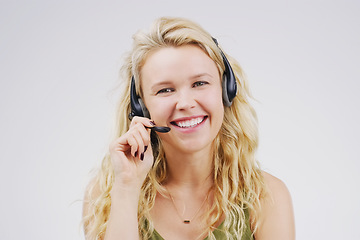 Image showing Call center, woman or consultant in studio portrait with headset, smile and tech support by background. Female agent, telemarketing and customer service job with mic, voip and happy for consulting