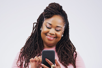 Image showing Phone, happy and face of black woman in studio with smile for social media, internet and online chat. Communication, white background and female person on smartphone for website, mobile app and text